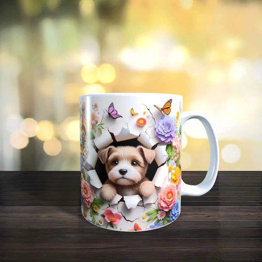 Keramiktasse mit 3D-Motiv eines kleinen Terrier-Welpen in einem floralen Rahmen