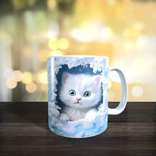 Keramiktasse mit 3D-Katzenmotiv, weißes Kätzchen im winterlichen Design mit blauen Augen