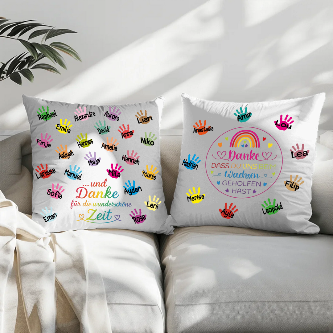Personalisierte schwarze Kissen mit bunten Handabdrücken und Dankesmotiven, individuell gestaltbar mit Namen – ideales Geschenk für Erzieher oder Lehrer