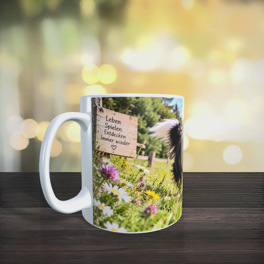 Produktvideo der Border-Collie-Tasse mit Ansichten des Hundemotivs und des Spruchs „Stillstehen war nie der Plan.“